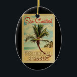 Ornamento De Cerâmica Viagens vintage de Árvore Palm San Cristobal<br><div class="desc">Um impressão de arte da República Dominicana de San Cristobal,  do século médio único,  no estilo de poster viagens vintage. Ele apresenta uma palmeira curva na praia arenosa com oceano sob um céu azul nublado.</div>