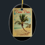Ornamento De Cerâmica Viagens vintage de Palmeira de Puerto Plata<br><div class="desc">Um impressão de arte do século médio moderno porto-plata,  República Dominicana,  no estilo viagens vintage. Ele apresenta uma palmeira curva na praia arenosa com oceano sob um céu azul nublado.</div>