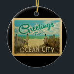 Ornamento De Cerâmica Viagens vintage de praia de Ocean City<br><div class="desc">Esta design do cartão postal da Ocean City apresenta uma praia arenosa com uma bela água turquesa oceânica e acima do mar,  um céu azul com nuvens brancas onduladas. No estilo viagens vintage.</div>