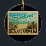 Ornamento De Cerâmica Viagens vintage Panamá City Beach<br><div class="desc">Esta design do cartão postal Vintage da Cidade do Panamá apresenta uma praia arenosa com uma bela água turquesa oceânica e acima do mar,  um céu azul com nuvens brancas onduladas. No estilo viagens vintage.</div>