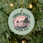 Ornamento De Cerâmica Vignette Retroativo de Cannon Beach<br><div class="desc">O ornamento de manutenção de na moda apresenta uma vista de água cor-de-rosa com estilo retrorado da praia de Cannon,  OU sobre fundo verde pastel.</div>