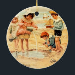 Ornamento De Cerâmica Vintage Antiguamente Beach Boy Children Fine Art<br><div class="desc">Na praia - Um antigo impressão de arte de crianças vitorianas brincando na areia. Um trabalho de arte impressão gráfico de arte costeira.</div>
