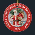 Ornamento De Cerâmica Vintage Santa Claus<br><div class="desc">Vintage Papai Noel com vergreens e presentes de Natal e tipografia verde personalizável. Feliz Natal do nome da família e do ano.</div>