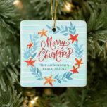 Ornamento De Cerâmica Watercolor Ocean ondas New Home Beach Natal<br><div class="desc">Elevem a vossa decoração costeira de Natal com o nosso Enfeites de natal de Praia. Esta peça requintada apresenta uma coroa de estrelas-do-mar delicadamente trabalhadas e algas-marinhas, colocadas contra um fundo de ondas abstrato de cor-de-água cativante. Torne este ornamento exclusivamente seu personalizando-o com seu nome familiar, adicionando um toque quente...</div>
