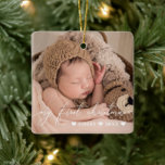 Ornamento De Cerâmica White Overlay Script Baby's First Christmas Photo<br><div class="desc">O primeiro ornamento de Natal do bebê de dois lados,  ao qual você pode adicionar duas fotos do seu bebê,  uma em cada lado. O meu primeiro Natal está escrito em uma delicada escrita branca. Adicione o nome do seu bebê e o ano!</div>
