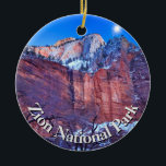 Ornamento De Cerâmica Zion National Park Winter Snow<br><div class="desc">Este lindo ornamento mostra uma foto de neve de inverno da ascensão da lua sobre o Templo de Sinewava,  Zion National Park,  Utah. Adicione sua própria mensagem personalizada para tornar este design seu! Fotografia criada pela fotógrafa Maria Jeffs,  prêmio vencedora.</div>