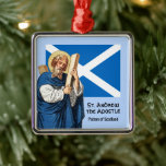 Ornamento De Metal Andrew, o Apostle e a Bandeira da Escócia<br><div class="desc">Entre seus muitos patrocinadores, Ruas, Andrew é o patrono nacional da Escócia. Aqui, uma Rua pensiva. Andrew, empalhado em um manto branco e azul, se inclina sobre uma grande cruz ou salgado em forma de x de madeira que era o instrumento de seu martírio c. 70. Atrás dele está a...</div>