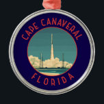 Ornamento De Metal Círculo Retroalterado do Cabo Canaveral da Florida<br><div class="desc">Cabo Canaveral retro vetor viagem design. Cabo Canaveral é uma cidade na costa atlântica da Flórida. O Centro Espacial Kennedy,  ao norte da cidade,  apresenta uma simulação de lançamento do ônibus da NASA e memorabilidades do astronauta.</div>