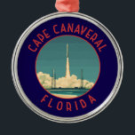 Ornamento De Metal Círculo Retroalterado do Cabo Canaveral da Florida<br><div class="desc">Cabo Canaveral retro vetor viagem design. Cabo Canaveral é uma cidade na costa atlântica da Flórida. O Centro Espacial Kennedy,  ao norte da cidade,  apresenta uma simulação de lançamento do ônibus da NASA e memorabilidades do astronauta.</div>