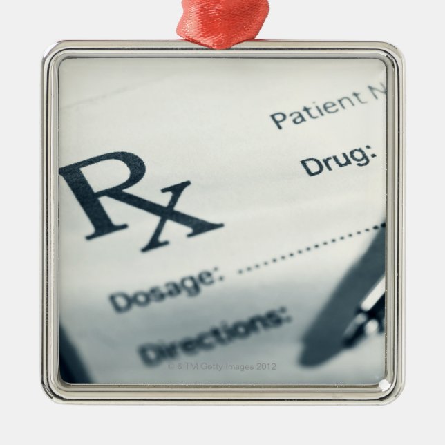 Ornamento De Metal Feche acima da almofada e da caneta da prescrição (Frente)