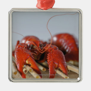 Ornamento De Metal Fim-acima de um caranguejo em varas