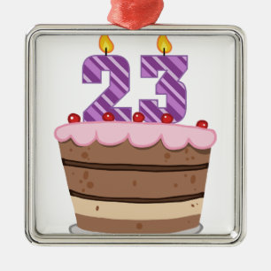 Ornamento De Metal Idade 23 no bolo de aniversário