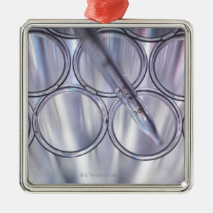 Ornamento De Metal Pipeta no tubo de ensaio