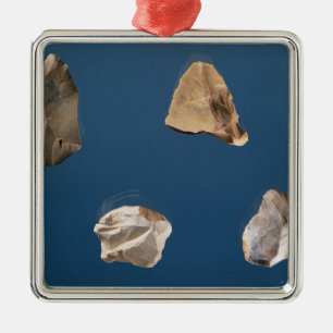 Ornamento De Metal Quatro ferramentas, 35000-10000 BC