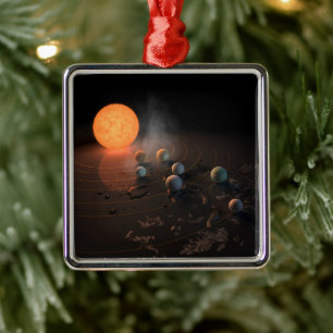 Ornamento De Metal Sete planetas em órbita em torno da estrela.