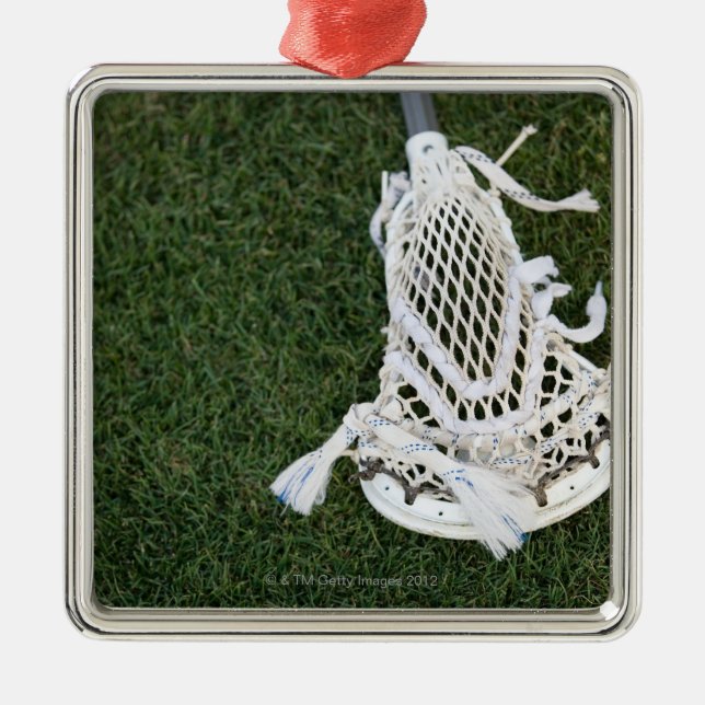 Ornamento De Metal Vara do Lacrosse na grama (Frente)