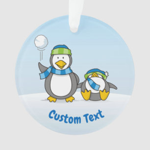 Ornamento de pinguins em neve