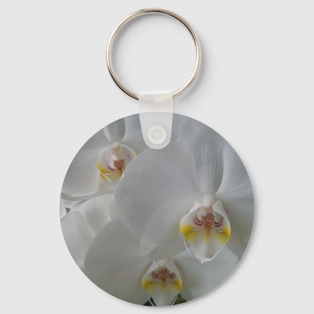 Orquídeas brancas impressionantes em um chaveiro (Frente)