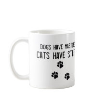 Os cães têm gatos do mestrado ter a caneca do