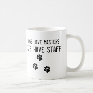 Os cães têm gatos do mestrado ter a caneca do