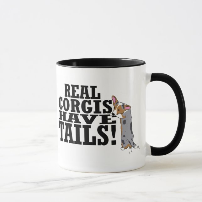 Os Corgis reais têm a caneca das caudas (Direita)