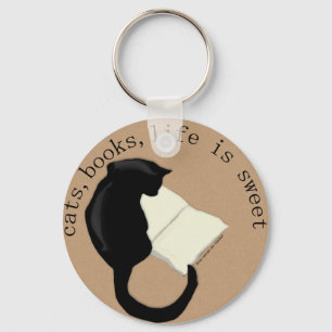 Os gatos, livros, vida são o chaveiro doce v2