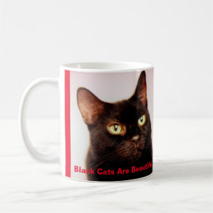 Os gatos pretos são caneca de café bonita (vers