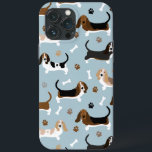 Ossos do Cachorro do Cachorro-Basset e Pedras<br><div class="desc">Cães de Caça-Basset com casacos castanhos,  pretos,  brancos e limões com ossos de cão espalhados e pata imprime padrões divertidos para cães.</div>
