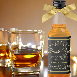 Ouro obrigado da garrafa do licor do casamento