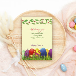 Ovos de Páscoa coloridos com um Cartão de Férias d