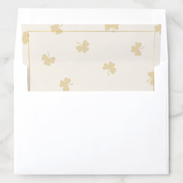 Padrão de Trevo Dourado Creme e Dourado Elegante