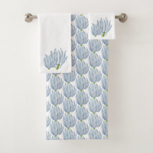 Palitos de giz azul num conjunto de toalhas de ban