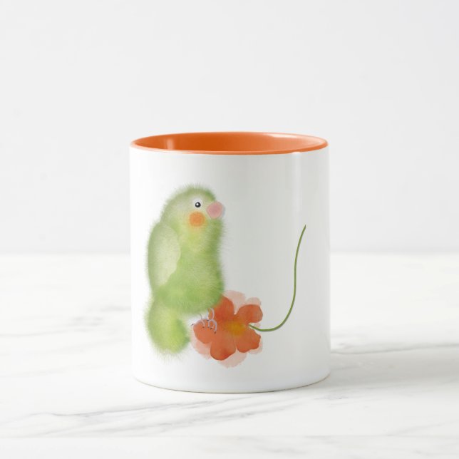 Papagaio verde com caneca de flor pela ORDesigns. (Centro)