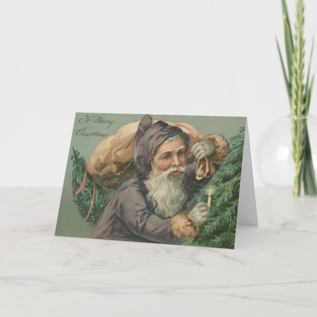 Papai noel com um cartão de Natal do saco (Frente)