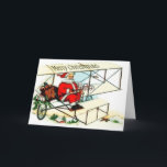 Papai noel do vintage que voa o cartão de Natal<br><div class="desc">Este cartão do Natal caracteriza uma cena de Papai Noel do vintage. O papai noel está voando um biplano para entregar seus brinquedos a todas as crianças do mundo. Esta cena do avião do papai noel do vintage é muito bonito e faz um grande cartão de cartões de natal do...</div>