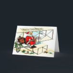Papai noel do vintage que voa o cartão de Natal<br><div class="desc">Este cartão do Natal caracteriza uma cena de Papai Noel do vintage. O papai noel está voando um biplano para entregar seus brinquedos a todas as crianças do mundo. Esta cena do avião do papai noel do vintage é muito bonito e faz um grande cartão de cartões de natal do...</div>