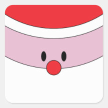 Papai Noel encara a etiqueta do presente de Natal