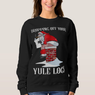 Papai noel que deixa cair fora da camisa engraçad