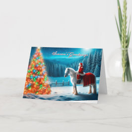 Papais noeis em seu cavalo admirando um cartão de 