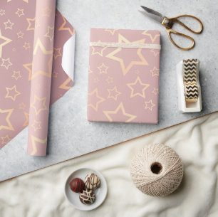 Papel de embrulho cor-de-rosa das estrelas ouros