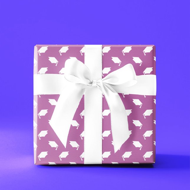 Papel de embrulho rosa com tampas de graduação bra (Criador carregado)