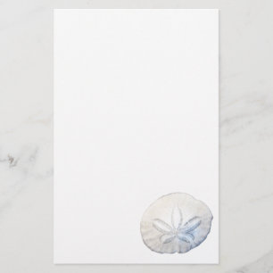 Papel de papelaria de fotos em dólares de areia