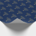 Papel De Presente Azul Dourado do teste padrão de Hanukkah Menorah<br><div class="desc">Envolva seus presentes no estilo esta época natalícia com nosso papel de embrulho elegante de Hanukkah. Estas características que de design simples mas chiques um fundo dos azuis marinhos com menorahs do ouro do falso repetiu em um teste padrão. Projetado pelo © Tim Coffey e Susan Coffey dos artistas.</div>
