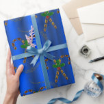 Papel De Presente Canas ouros de doces no Natal Azul<br><div class="desc">Um elegante e contemporâneo papel de embalagem de Natal azul, com pares de canas de ouro doces decoradas com folhas e bagas ocas, sobre fundo na moda azul-gradiente. Este plástico azul colorido e dourado de Natal também tem minúsculas trilhas douradas entre as canas doces, para um toque extra de luxo....</div>