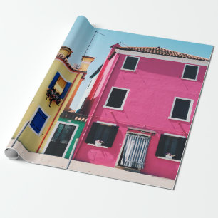 PAPEL DE PRESENTE CASAS CONCRETAS AMARELO E PINCO DURANTE O DIA