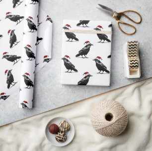 Papel De Presente Corvo preto com padrão de chapéu de natal vermelho
