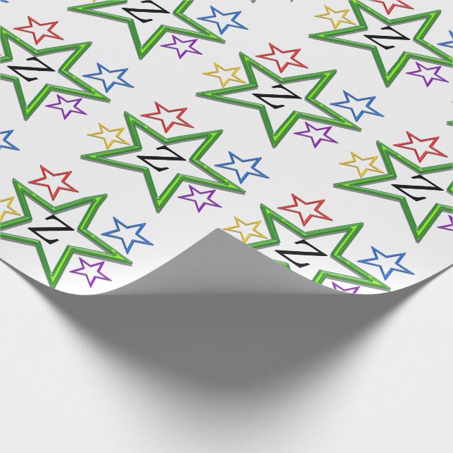 Papel de Presente - Estrelas com Inicial (Ponta)