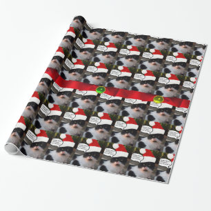 PAPEL DE PRESENTE GATO DE NATAL COM CHAPÉU DE SANTA CLAUS E BORRACHA
