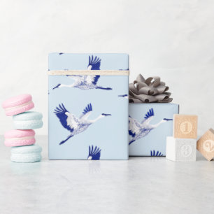 Papel De Presente Guindastes azuis e brancos