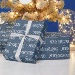 Papel De Presente MERRY CHRISTMAS Texto Em Estrelas<br><div class="desc">Texto de NATAL de MERRY branco com floco de neve e design de estrela em fundo azul. O texto pode ser editado.</div>